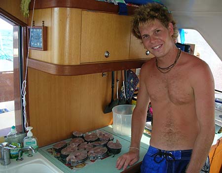 002 Chris with his wahoo steaks, passage to Maldives